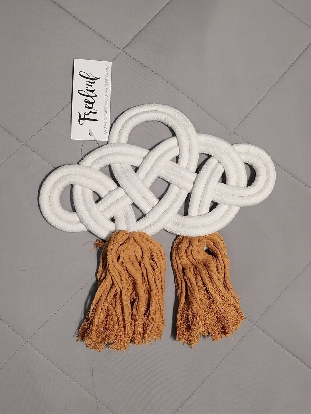 Freeleaf White Knot Wall Accent with Mustard Tassels